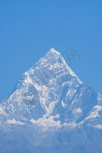 山峰看起来像金字塔 在安纳普尔纳保护区背景图片