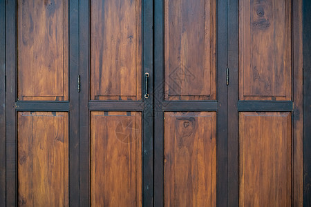 黑色和棕色的木制折叠门背景