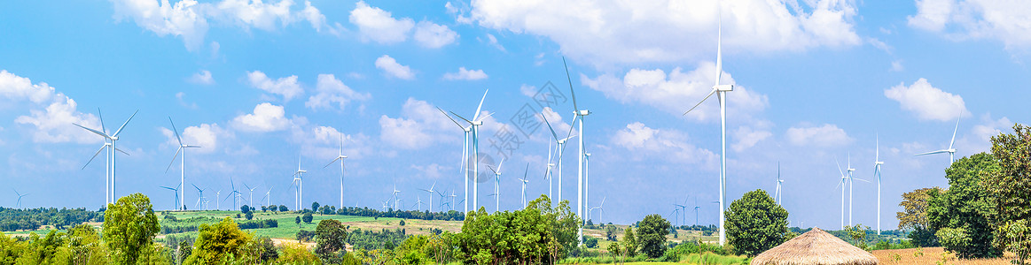 风力涡轮发电机在山顶上划线背景图片