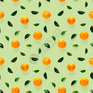 水果图案普通话无缝图案 橘子和克蕾婷 以绿色背景与绿叶隔绝 收集完好的无缝图案墙纸热带异国作品收藏橙子设计水果柑桔情调背景