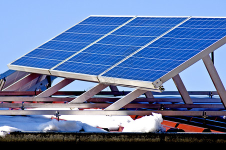 屋顶雪冬季太阳能电池板太阳商业环境季节性生产光伏发电机天空控制板细胞背景