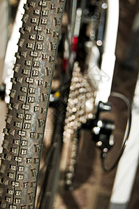 自行车轮胎越野山地车黑色国家车轮运动轮缘网格宏观橡皮背景图片