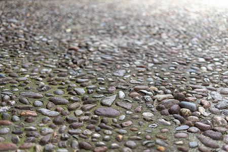 卵石路由石头组成的路面上铺满了石块建筑学岩石人行道地面正方形街道材料卵石墙纸铺路背景
