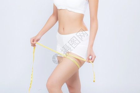 紧闭的天主教大腿瘦瘦和有体量异索拉特的妇女身体腰部健身房皮肤肥胖橘皮女孩数字测量运动女士背景