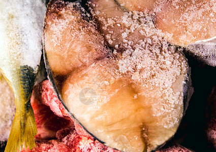 甜甜圈鱼冷冻鱼肉和猪肉食物白色鱼片海鲜市场烹饪健康背景