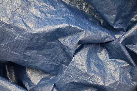 特写塑料箔和塑料表面的详细视图沙发石头线条材料蓝色金属皮革织物墙纸艺术背景