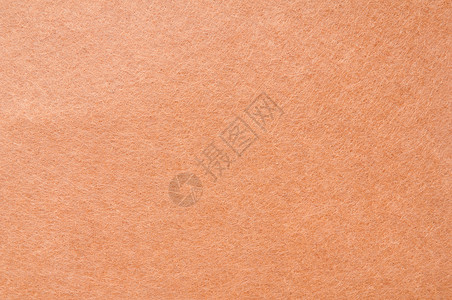 精纺深棕色或橙色天鹅绒或浮板花壁的纹理背景背景