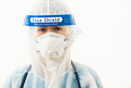 武汉护士众身着个人防护设备制服的医务人员医生 戴面罩保护i背景