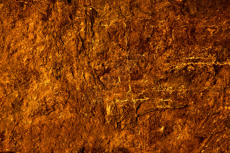 侵蚀表面古代熔岩花岗岩石表面的洞穴内部火山岩石侵蚀墙纸橙子石头地面奢华床单花岗岩背景