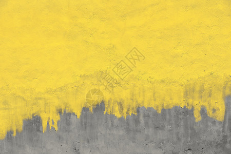 风化的黄漆灰色混凝土墙缺陷拉丝黄色水泥材料背景图片