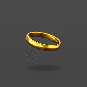 黑色背景上的金戒指背景图片
