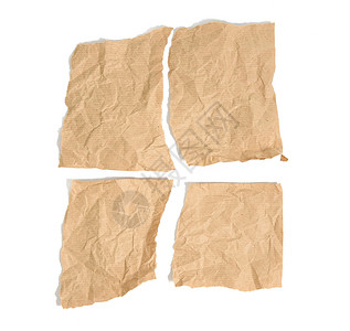 四张撕破的棕色牛皮纸 隔离在白色背景上背景图片