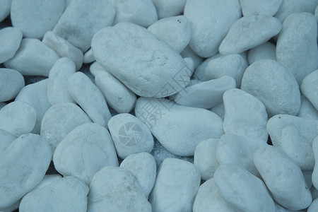 白色石头背景的顶部视图墙纸卵石材料砂岩圆形海滩背景图片