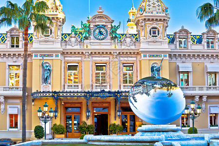 蒙特卡罗赌场的著名标志性外表风景大街奢华海景入口日落海岸天蓝色建筑学旅游建筑背景