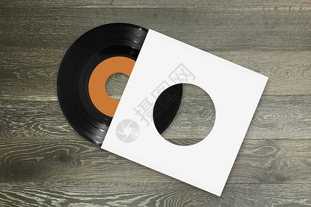 具有橙色标签和木底白袖的单一45rpm单450微米黑乙烯唱片背景图片
