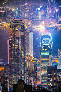 香港市中心著名的香港天际线城市景观在黄昏时分从香港维多利亚峰看首都港口吸引力建筑地标灯光建筑学日落码头商业背景