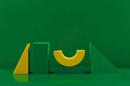 具有复制空间的绿色和黄色图形的双色调几何组合背景图片