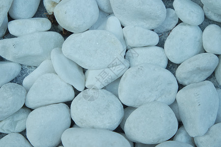 白色石头背景的顶部视图墙纸海滩圆形卵石砂岩材料背景图片