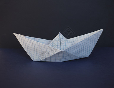 玩具纸纸船平方蓝色方格游戏背景图片