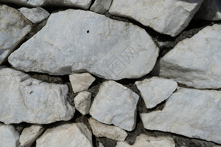 具有不均匀纹理的浅色大理石的自然背景闪光背景图片