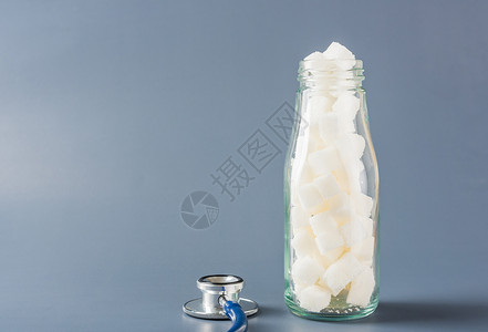 心糖藤玻璃瓶装满白糖立方体玻璃瓶重量肥胖玻璃精制糖尿病生活活力控制饮食果汁背景