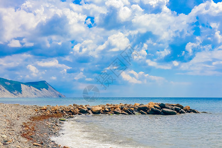 远到海面的角 海景曲线海岸线爬坡蓝色目的地旅游帆船海滩地平线鸟瞰图背景图片