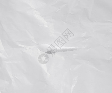 白色皱巴巴的羊皮纸纸质空白床单折痕材料皱纹背景图片