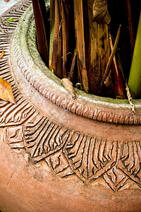 水厂用地球罐园艺绿色黏土棕色陶器花园装饰手工土制植物背景