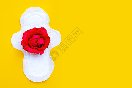 白色卫生巾 红色玫瑰和黄色背景的红玫瑰高清图片
