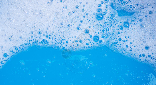 蓝色泡沫家务浴缸高清图片
