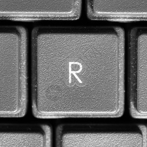 键盘上的R电脑键盘上的字母 R电子产品写作大写字母案件钥匙打字机技术办公室计算器背景