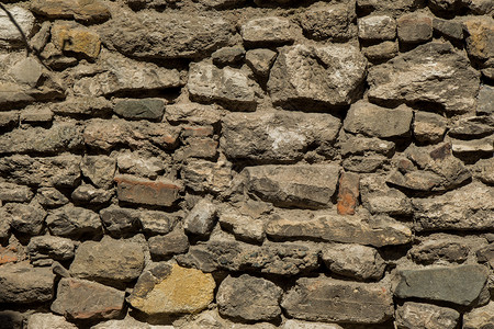 用同种石头砌成的墙墙纸建造砖块材料卵石建筑背景建筑学红色地面背景图片
