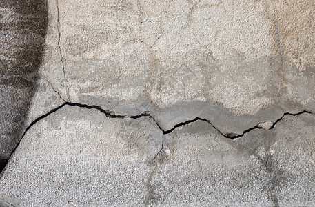 水泥混凝土旧脏混凝土墙的质地街道墙纸石膏纸板建筑古董材料崎岖水泥裂缝背景