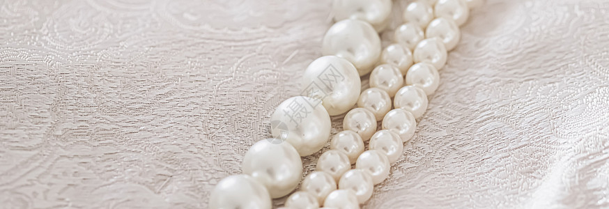 扫一扫动图珍珠首饰作为奢侈品 gif织物奢华项链白色新娘礼物丝绸婚礼材料宝石背景