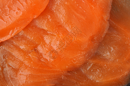 鲑鱼 平板上的红盐鱼的切片柠檬宏观海鲜小吃盘子食物美食动物甲壳类餐厅背景图片