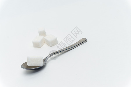 糖基海藻糖每茶匙卡路里糖糖基方糖每茶水龙口热量的糖立方糖糖果白色化合物摄影颗粒状碳水添加剂食物宏观蔗糖背景