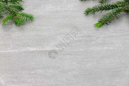 圣诞图案纹理背景 顶部是诺德曼冷杉的树枝 深灰色大理石背景 有文本的可用空间松针植物大理石纹白色绿色墙纸背景图片