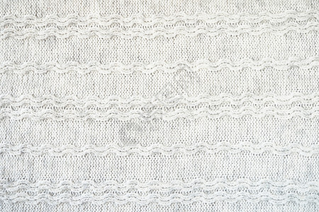 羊毛产品的质地 灰色背景宏观季节毛毯手工针织背景图片