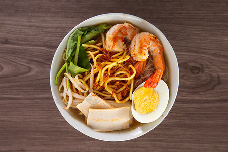 华人在马来西亚和新加坡流行的一流风味小贩街道辣椒海梅对虾盘子肉汤美食食物香料背景图片