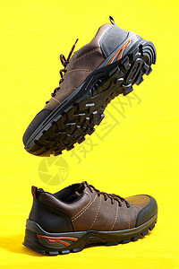 男鞋 男鞋 黄色的棕色运动鞋蒸汽悬浮皮革运动背景背景图片