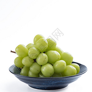 莫斯卡特美丽的一帮神马斯喀特绿葡萄 在蓝色的盘子上 孤立在白色背景甜点礼物营养奢华收成剪裁农业饮食产品销售背景