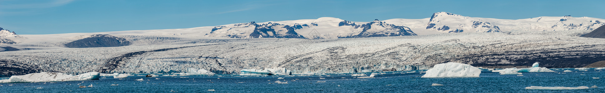 冰山和冰川舌头的冰川拉古乔库萨尔伦大湖全景 冰岛 夏季蓝色远足旅行观光气候支撑天空冒险波浪自由背景图片