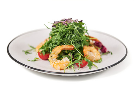 海鲜蔬菜沙拉配有新鲜菜食沙拉的优美盘子背景