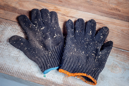 一双棉手套使用棉手套在工作时保护手花园羊毛装备防护障碍个人衣服纺织品安全材料背景