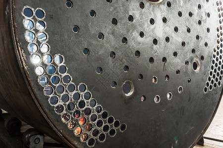 金属工业锅炉表面的近距离闭合背景图片