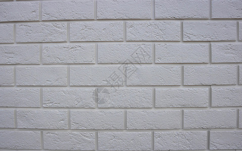 抽象纹理白色砖墙背景粗砌块建筑墙纸石头材料瓦砾护岸石方装饰风格石膏正方形石工背景图片