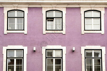 里斯本古老的色彩多彩和古老的外表场景古董观光历史性窗户金属房子公寓阳台单板背景图片