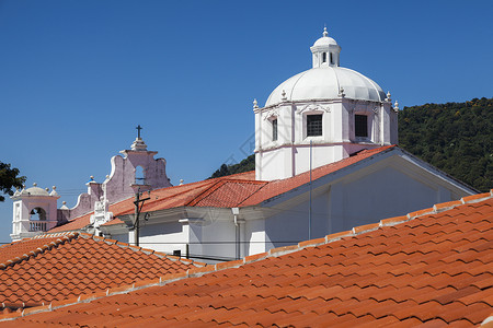 萨尔瓦多阿帕内卡教堂天空蓝色花路地标白色城市市中心晴天殖民天际背景图片