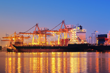 进出口业及物流业的集装箱船舶集装箱后勤货物商业贸易进口送货货运船运机器工作背景图片