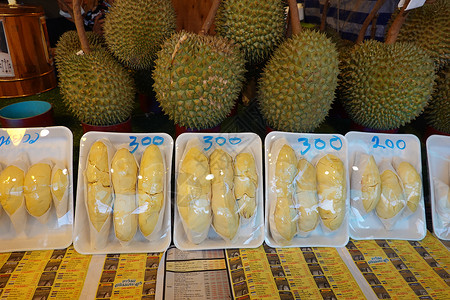 富通市在市场上销售的包件中产黄果 在泰国作为季节性水果包装中的黄当量核糖农场味道美食甜点气味健康饮食尖刺营养生食荆棘背景